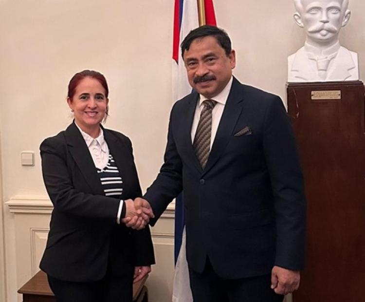 Ambassador Belal is seen with Ambassador Pino Rivero